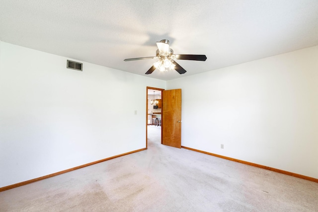 6002 E Molly Ln, Columbia, MO 65202 - carpeted empty room featuring baseboards and ceiling fan