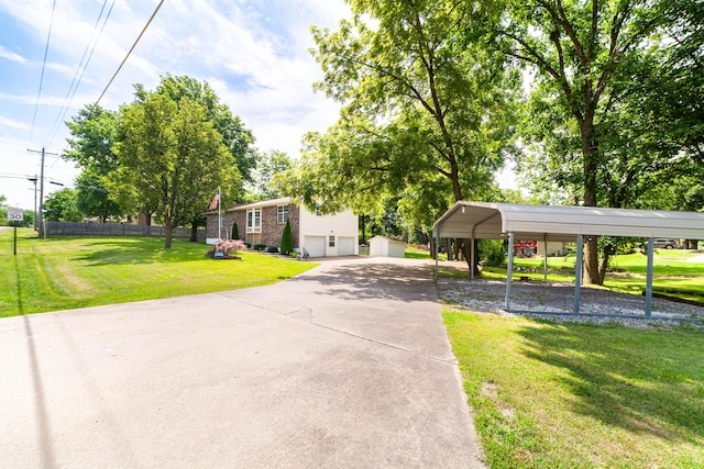 6002 E Molly Ln, Columbia, MO 65202 - view of front of house featuring a detached carport, driveway, and brick siding