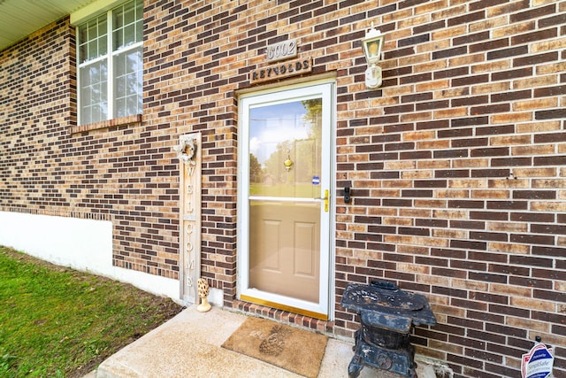 6002 E Molly Ln, Columbia, MO 65202 - doorway to property featuring brick siding