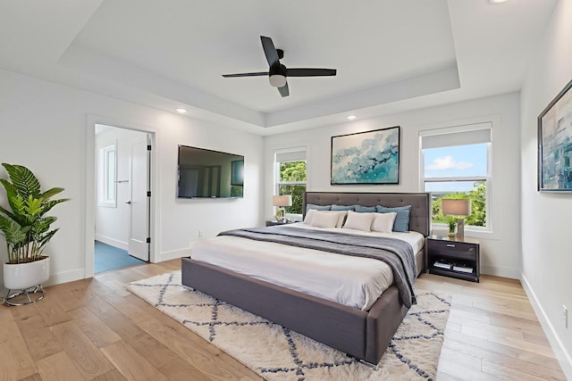 605 Angels Rest Way, Columbia, MO 65203 - bedroom with a tray ceiling, light wood-style floors, recessed lighting, and ceiling fan