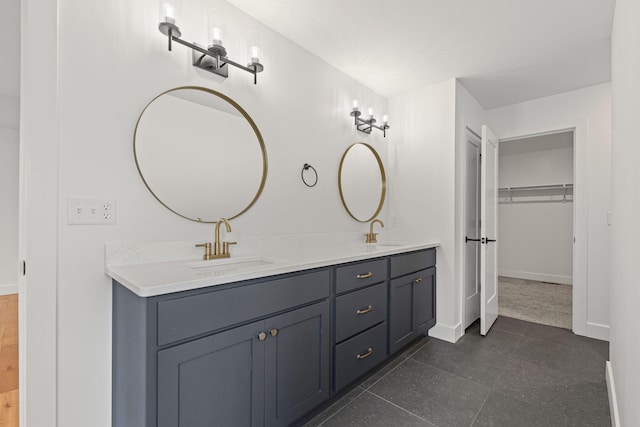 605 Angels Rest Way, Columbia, MO 65203 - full bathroom with double vanity, a spacious closet, and tile patterned flooring
