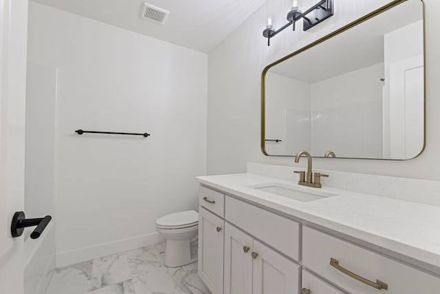 605 Angels Rest Way, Columbia, MO 65203 - bathroom featuring vanity, a shower, and marble look tile flooring