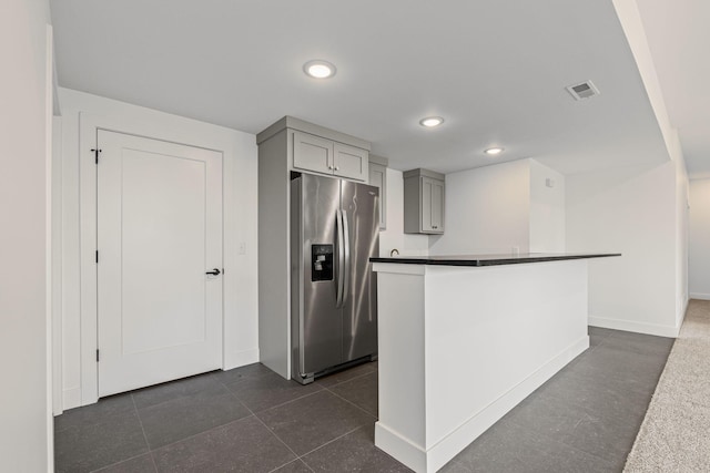 605 Angels Rest Way, Columbia, MO 65203 - kitchen featuring stainless steel fridge, gray cabinets, dark countertops, recessed lighting, and dark tile patterned floors