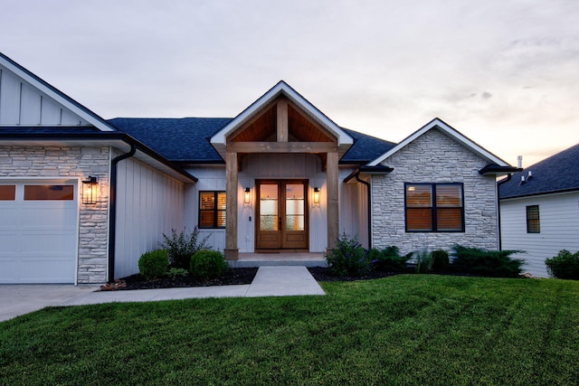 605 Angels Rest Way, Columbia, MO 65203 - view of front of property featuring stone siding, board and batten siding, french doors, and a front yard