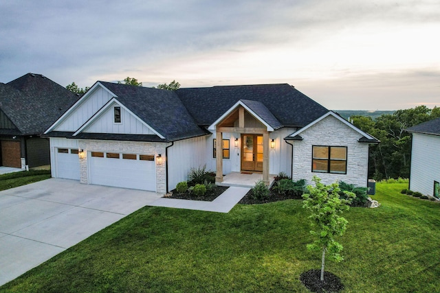 605 Angels Rest Way, Columbia, MO 65203 - modern inspired farmhouse with stone siding, board and batten siding, a garage, driveway, and a front yard