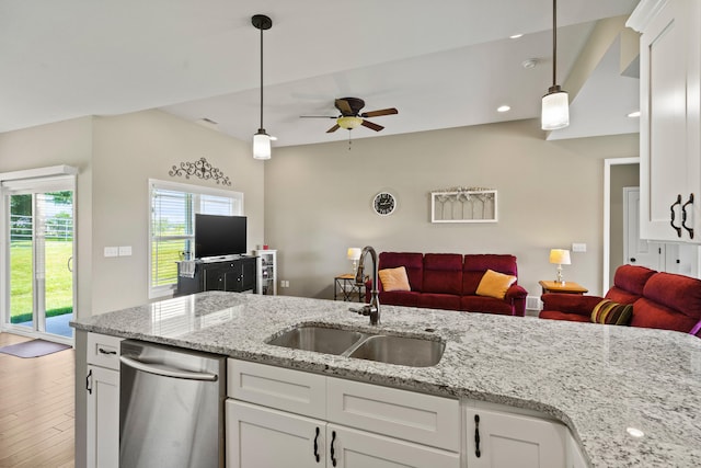 15409 Allegiance Ave, Ashland, MO 65010 - kitchen with open floor plan, ceiling fan, white cabinetry, pendant lighting, and wood finished floors