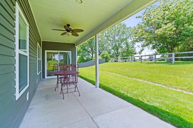 15409 Allegiance Ave, Ashland, MO 65010 - fenced backyard featuring a patio and ceiling fan