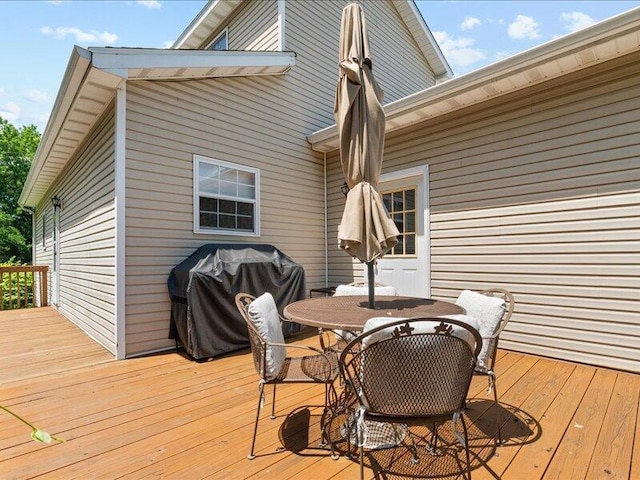 205 Johnson Ct, Ashland, MO 65010 - wooden terrace with grilling area and outdoor dining space