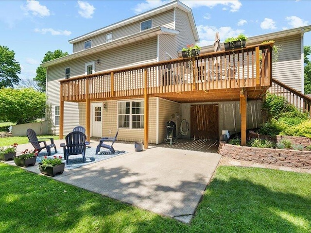 205 Johnson Ct, Ashland, MO 65010 - back of house featuring a patio area, a wooden deck, a lawn, and concrete driveway