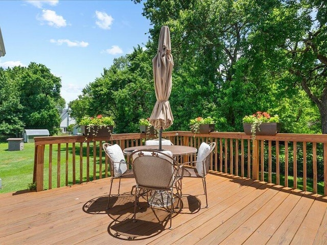 205 Johnson Ct, Ashland, MO 65010 - wooden deck featuring a yard and outdoor dining area