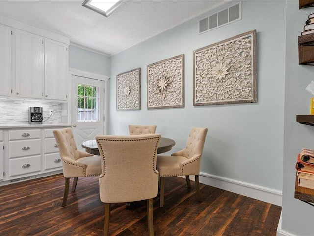 205 Johnson Ct, Ashland, MO 65010 - dining space featuring dark wood-style flooring and baseboards