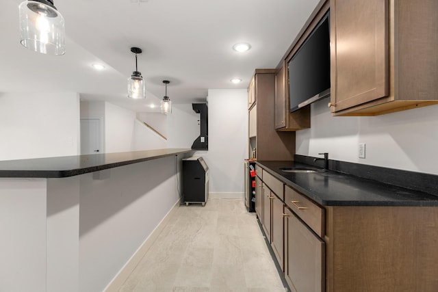 5413 Briar Rose Ct, Columbia, MO 65203 - kitchen featuring recessed lighting, light marble finish flooring, and decorative light fixtures