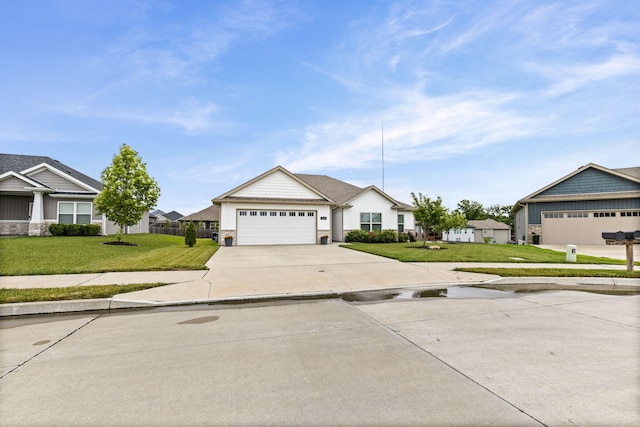 3515 Goldenwood Dr, Columbia, MO 65202 - ranch-style house featuring driveway, a front yard, an attached garage, and a residential view