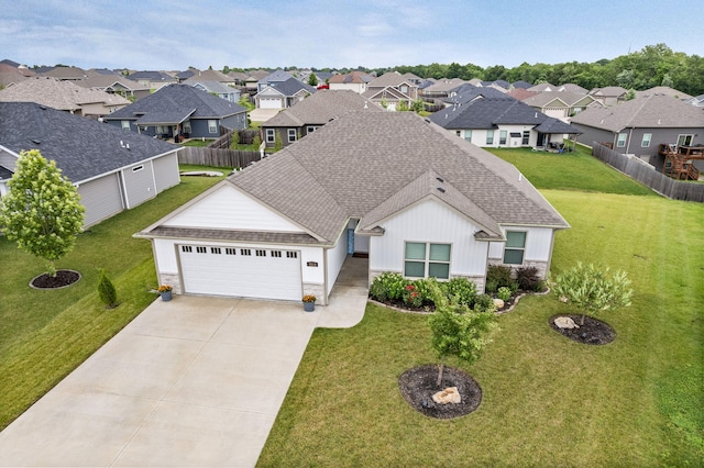 3515 Goldenwood Dr, Columbia, MO 65202 - view of front of home featuring stone siding, roof with shingles, a garage, and a residential view