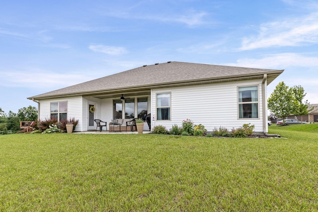 3515 Goldenwood Dr, Columbia, MO 65202 - back of house featuring a lawn, a patio, and a ceiling fan