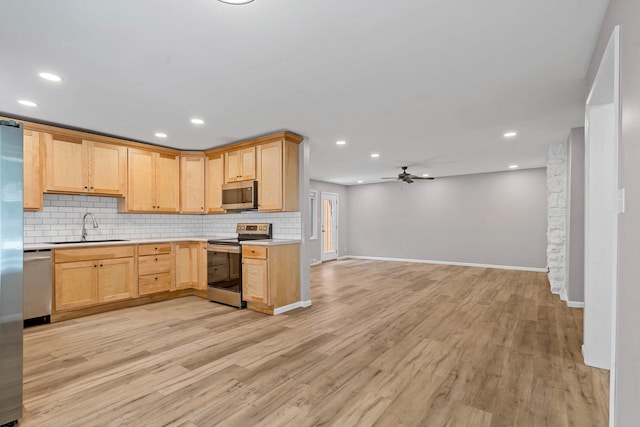 522 Huntridge Dr, Columbia, MO 65201 - kitchen featuring stainless steel appliances, light brown cabinets, tasteful backsplash, ceiling fan, and recessed lighting