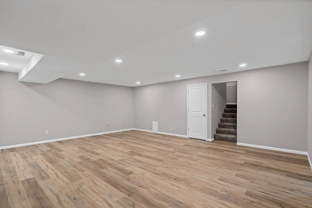 522 Huntridge Dr, Columbia, MO 65201 - finished below grade area with light wood-type flooring, stairs, and recessed lighting