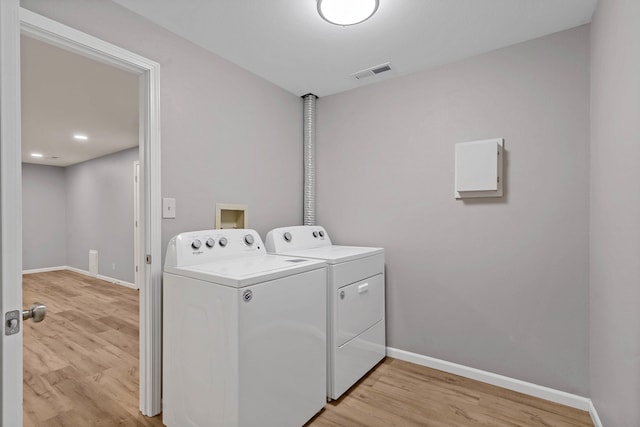 522 Huntridge Dr, Columbia, MO 65201 - laundry room featuring independent washer and dryer and light wood-style floors
