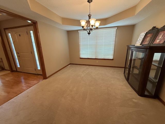 4413 Shoram Ct, Columbia, MO 65203 - foyer entrance with a chandelier and light colored carpet