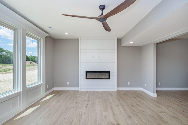 3321 Gray Birch Dr, Columbia, MO 65202 - unfurnished living room with ceiling fan, light wood-style flooring, a fireplace, and recessed lighting