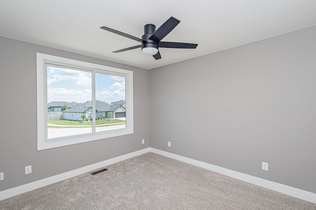 3321 Gray Birch Dr, Columbia, MO 65202 - spare room featuring carpet and ceiling fan