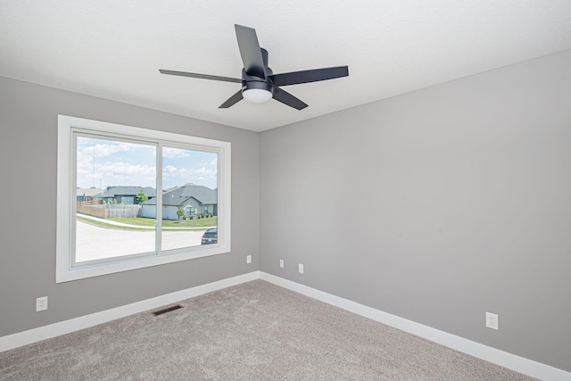 3321 Gray Birch Dr, Columbia, MO 65202 - unfurnished room with a ceiling fan and carpet flooring