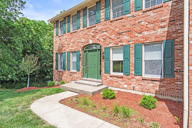 3348 S Old Ridge Rd, Columbia, MO 65203 - property entrance featuring brick siding and a lawn