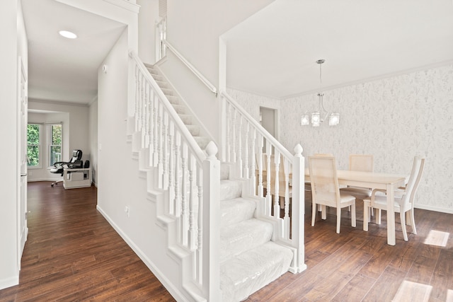 3348 S Old Ridge Rd, Columbia, MO 65203 - stairway featuring wood finished floors and a chandelier