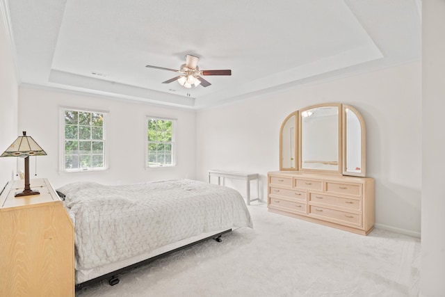 3348 S Old Ridge Rd, Columbia, MO 65203 - bedroom with a tray ceiling, carpet flooring, and ceiling fan