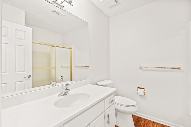 3348 S Old Ridge Rd, Columbia, MO 65203 - bathroom featuring wood finished floors, vanity, and an enclosed shower