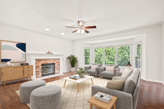 3348 S Old Ridge Rd, Columbia, MO 65203 - living area featuring healthy amount of natural light, a ceiling fan, wood finished floors, crown molding, and a fireplace