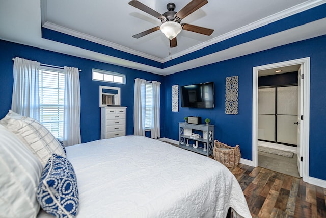 5808 Islip Dr, Columbia, MO 65201 - bedroom featuring dark wood-style floors, ornamental molding, a ceiling fan, and a raised ceiling