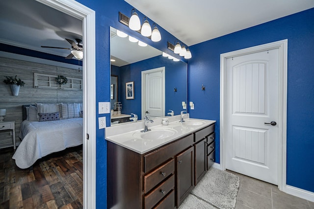 5808 Islip Dr, Columbia, MO 65201 - full bathroom featuring a ceiling fan, double vanity, ensuite bathroom, and tile patterned floors