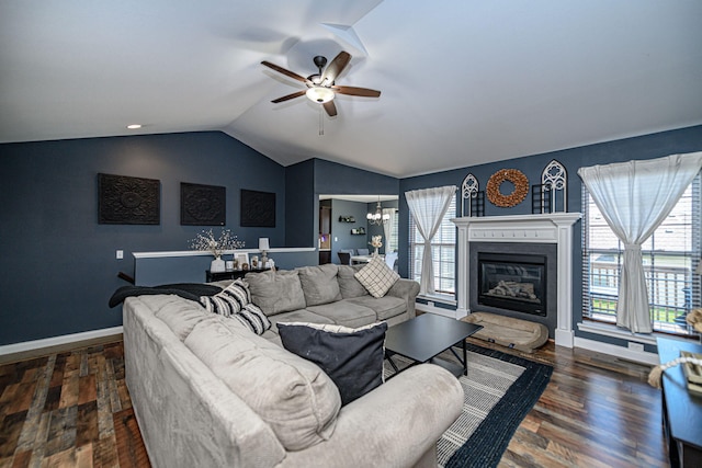 5808 Islip Dr, Columbia, MO 65201 - living area featuring a ceiling fan, healthy amount of natural light, lofted ceiling, wood finished floors, and a chandelier