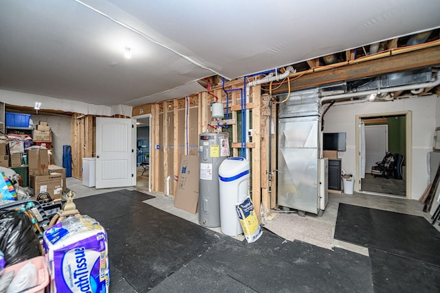 5808 Islip Dr, Columbia, MO 65201 - unfinished below grade area featuring water heater, heating unit, and washer / clothes dryer