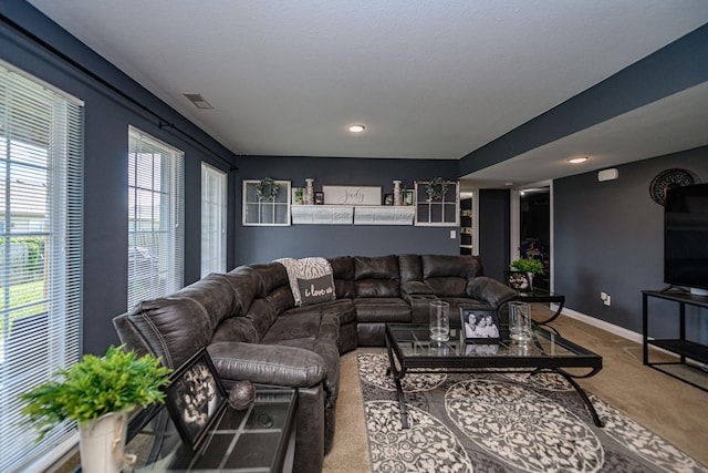 5808 Islip Dr, Columbia, MO 65201 - carpeted living area with baseboards and recessed lighting