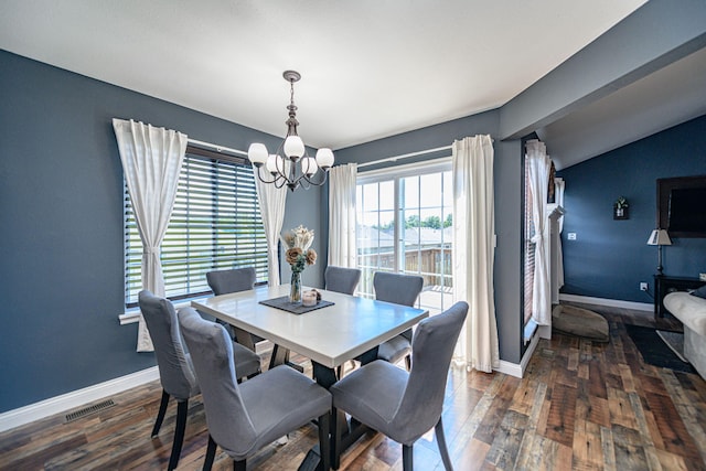 5808 Islip Dr, Columbia, MO 65201 - dining space featuring a chandelier, wood finished floors, and lofted ceiling