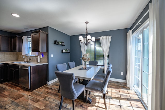 5808 Islip Dr, Columbia, MO 65201 - dining space featuring a chandelier, wood finished floors, and recessed lighting