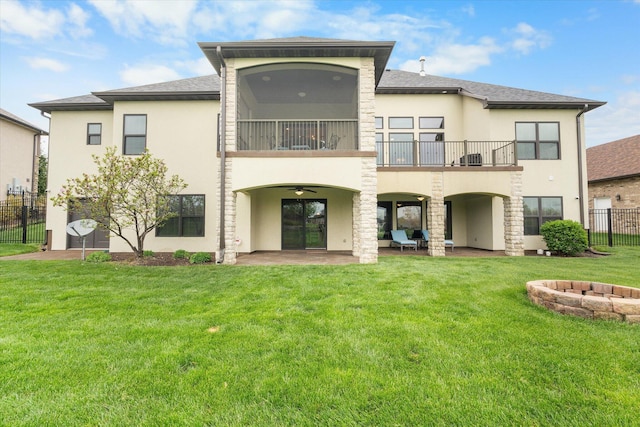 6406 Crooked Switch Ct, Columbia, MO 65201 - back of house with a ceiling fan, stucco siding, a balcony, a patio area, and roof with shingles