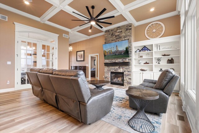 6406 Crooked Switch Ct, Columbia, MO 65201 - living room featuring coffered ceiling, a fireplace, ceiling fan, ornamental molding, and light wood-type flooring