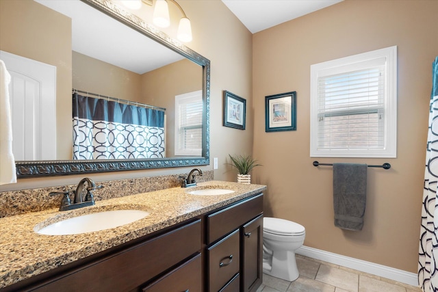 6406 Crooked Switch Ct, Columbia, MO 65201 - full bath with double vanity, tile patterned floors, and a shower with shower curtain