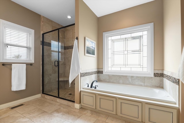 6406 Crooked Switch Ct, Columbia, MO 65201 - bathroom with a garden tub, a shower stall, and healthy amount of natural light