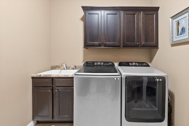 6406 Crooked Switch Ct, Columbia, MO 65201 - laundry area featuring cabinet space and washer and clothes dryer