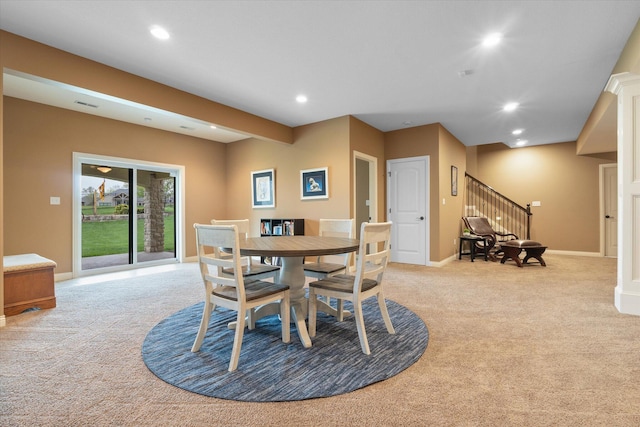6406 Crooked Switch Ct, Columbia, MO 65201 - dining room featuring light colored carpet, stairs, and recessed lighting