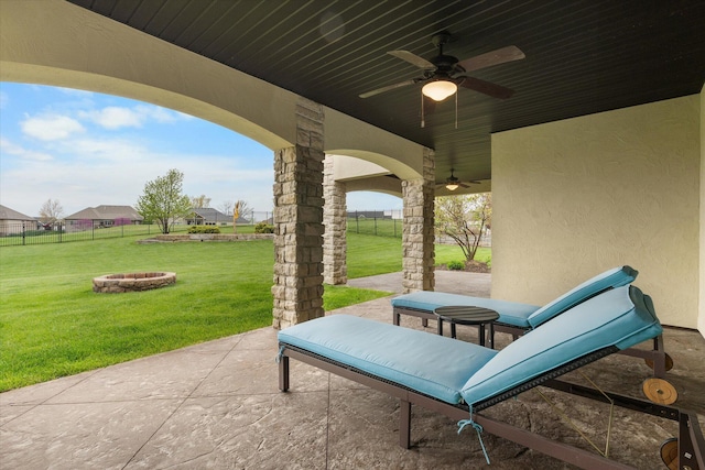 6406 Crooked Switch Ct, Columbia, MO 65201 - view of patio featuring a fire pit and a ceiling fan