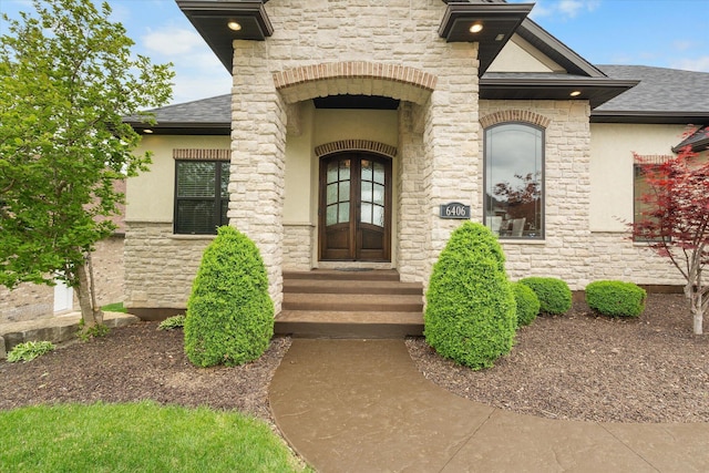 6406 Crooked Switch Ct, Columbia, MO 65201 - entrance to property with stone siding, stucco siding, and a shingled roof
