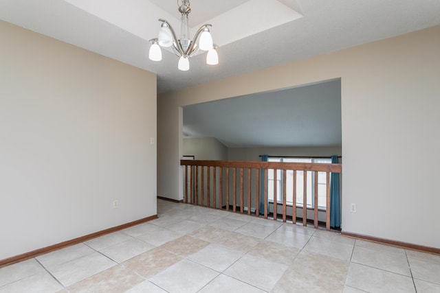 2109 Bridgewater Dr, Columbia, MO 65202 - tiled empty room with a chandelier and baseboards