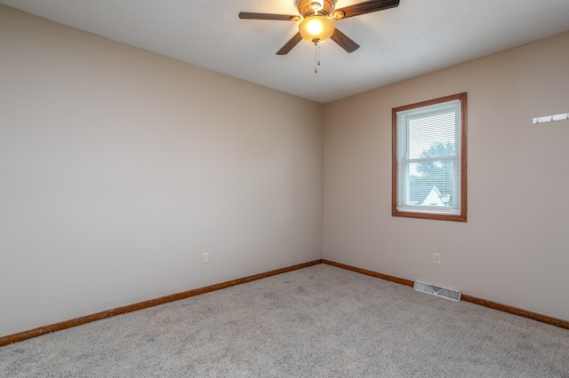 2109 Bridgewater Dr, Columbia, MO 65202 - spare room featuring carpet and ceiling fan