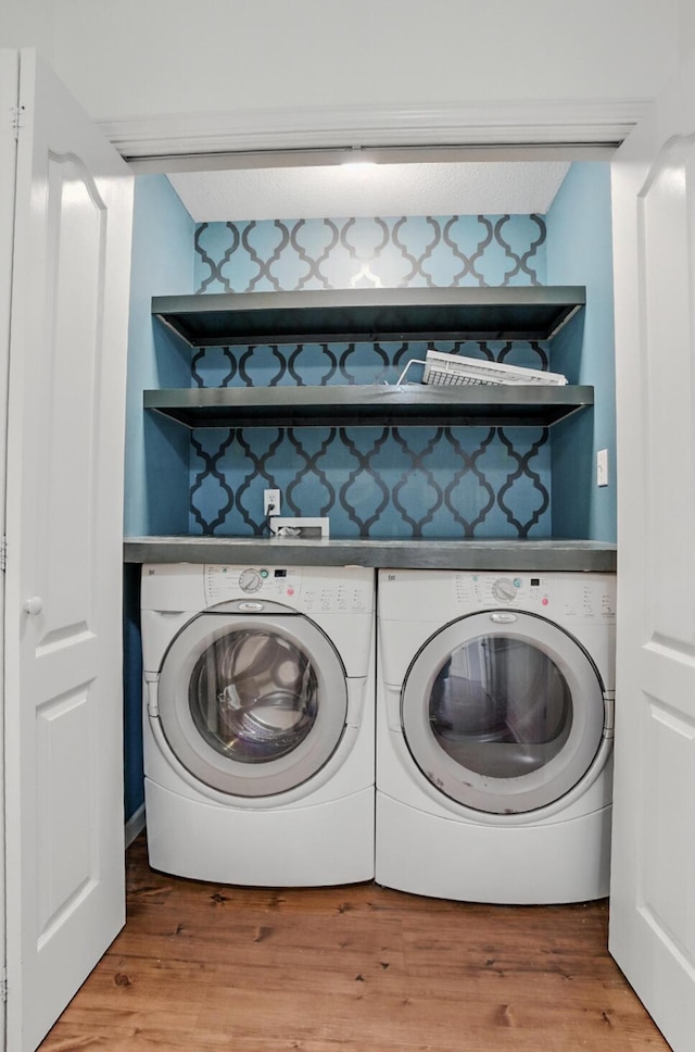 3904 Clydesdale Dr, Columbia, MO 65202 - laundry room with light wood-type flooring and washer and dryer