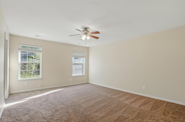 3904 Clydesdale Dr, Columbia, MO 65202 - unfurnished room with a ceiling fan, plenty of natural light, and carpet flooring